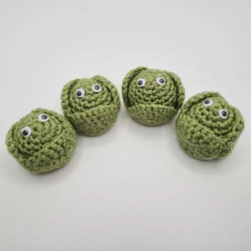 row of four crochet brussel sprouts
