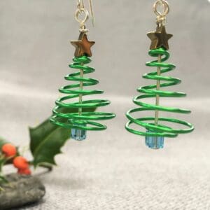 green wire spiral earrings with gold star