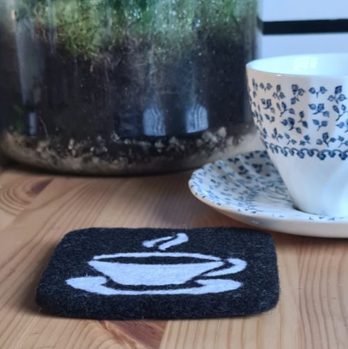 side view of needle felted tea cup coaster