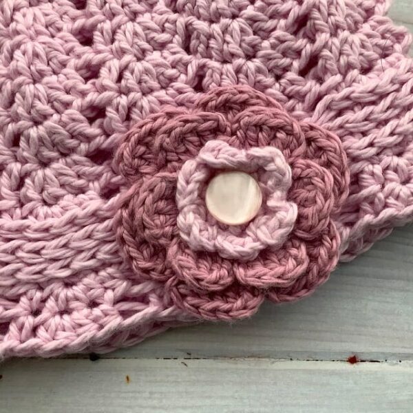 Crochet baby hat flower detail