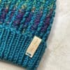hand knitted adult winter hat in Teal with detachable faux fur pompom - Image 4