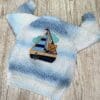 Boy's hand knitted cardigan with bear in a sailing ship applique and embroiodery