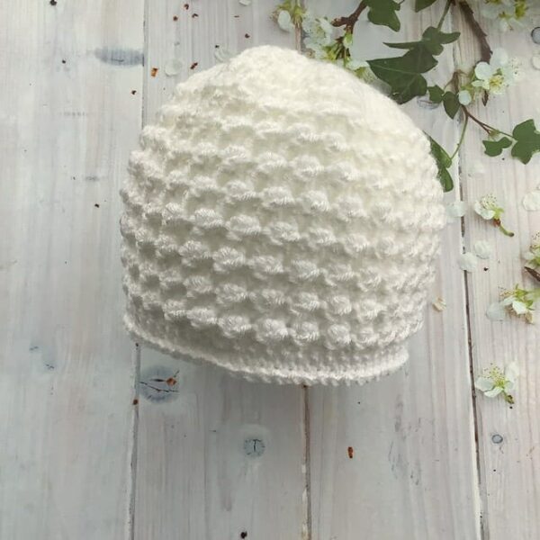 Crochet baby hat in white acrylic