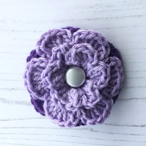 Crochet flower brooch