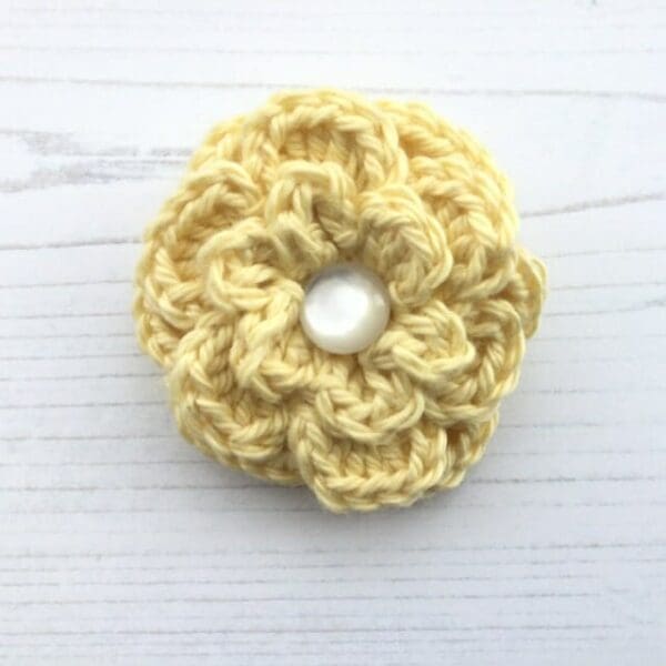 Crochet flower brooch