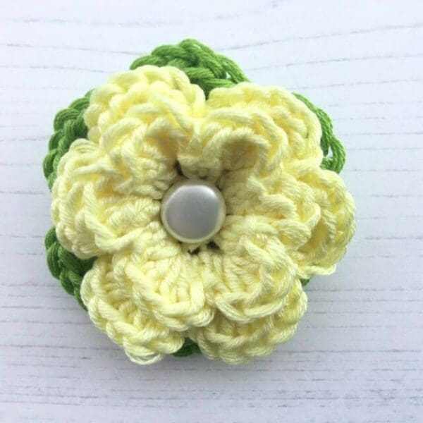 Crochet flower brooch