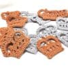 Crochet crown appliques in silver and gold yarn