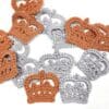 Crochet crown appliques in silver and gold yarn
