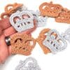 Crochet crown appliques in silver and gold yarn