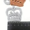 Crochet crown appliques in silver and gold yarn