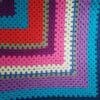 cheerful-crocheted-lap-blanket-granny-square