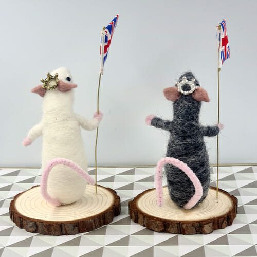 back of Needle felted mice holding a union flag