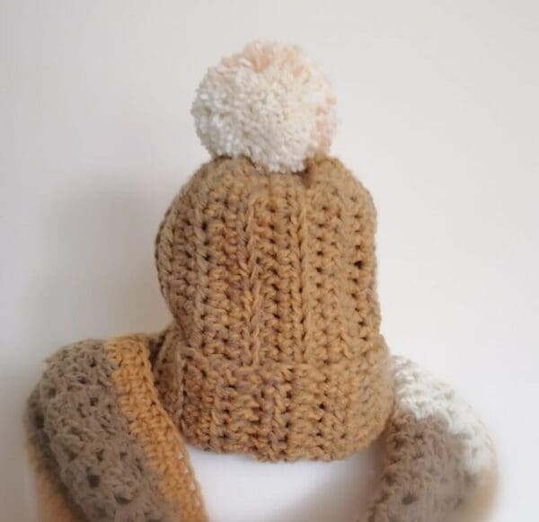 cosy-bobble-hat-in-mustards