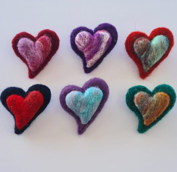 needle felted heart brooches