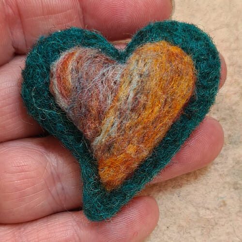 Teal and orange wool needle felted heart brooch