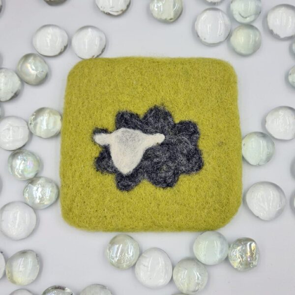 needle felted green coaster with grey sheep
