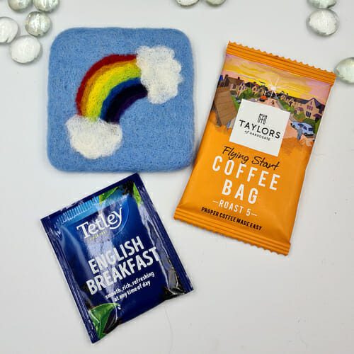 needle felted rainbow coaster with tea or coffee bag