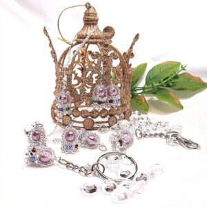 Small beaded silver coronation crown jewellery. Necklace, earrings, key rings and charms.