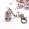 Beaded silver coronation crown key ring.