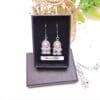 Beaded silver coronation crown earrings.