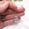 Beaded silver coronation crown necklace.