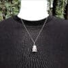 Beaded silver coronation crown necklace.