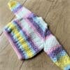 Baby cardigan to fit 0 - 6 months in pretty pastel shades - Image 4