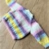 Baby cardigan to fit 0 - 6 months in pretty pastel shades - Image 3