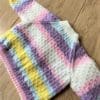 Baby cardigan to fit 0 - 6 months in pretty pastel shades - Image 2