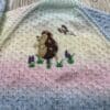 Girl's hand knitted cardigan to fit age 2 - 3 years - pastel shades with cute hedgehog embroidery - Image 5