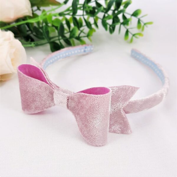 Velvet headband with matching bow in pink