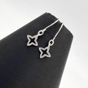 pretty 4 point open star earrings on drop silver ear wires
