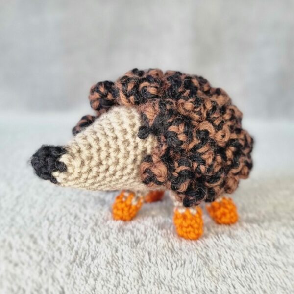Handmade soft toy animal made entirely from pure wool.