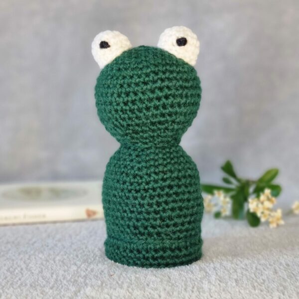 Crochet green frog made using only pure wool