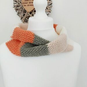 Coral cowl crochet scarf with infinity twist in orange, grey, cream and pink colourway yarn.