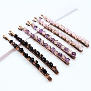 Set of six hair grips with crystal bead embellishments along the top edge. Clear, pink and purple, black and gold.