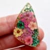 Resin wing pendant filled with dried flowers - Image 3