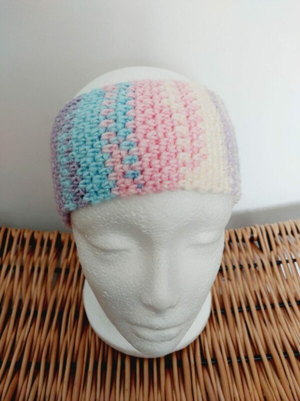 Ear Warmer headband on pastel colours of pink, purple blue and white crochet.