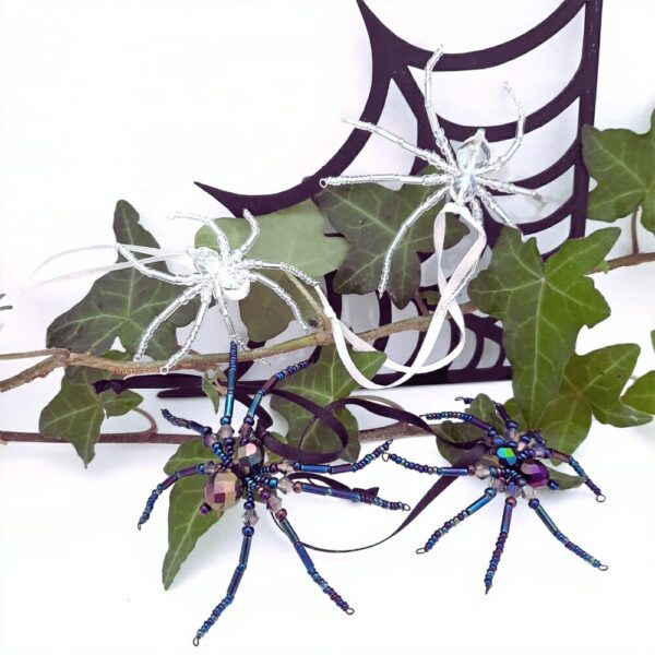 Halloween hanging spider decorations in silver and shimmery black beads.