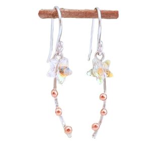Shooting star drop earrings. A crystal star with a silver and copper nugget tail.
