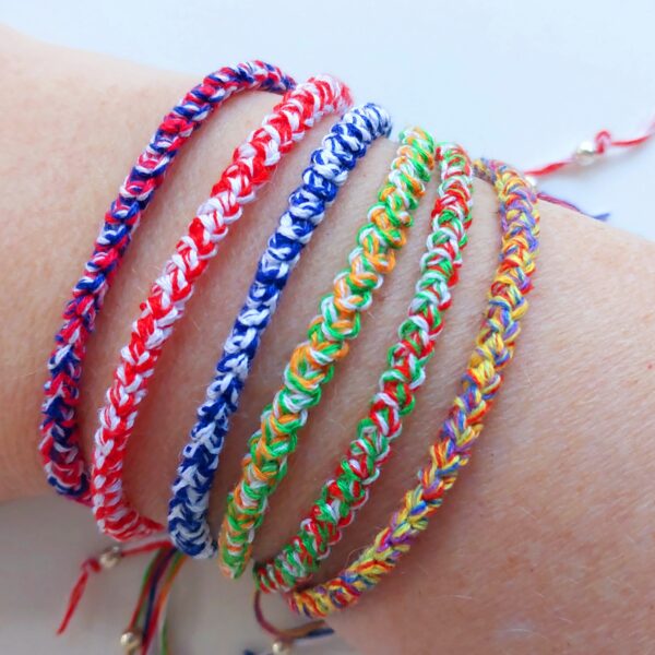 Six crochet cord bracelets in various colours inspired by National flag colours and rainbows.