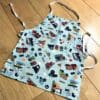 Child's adjustable cotton apron - transport themed