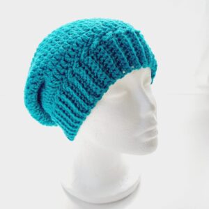 Crochet slouchy beanie hat with wide brim in teal yarn, called Sea Green.