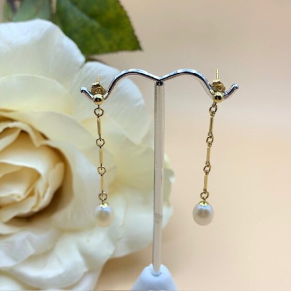 Pearl and gold stick chain drop earrings
