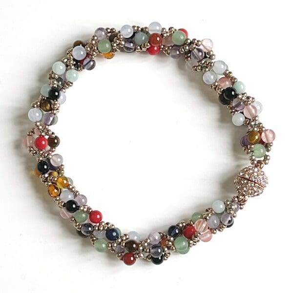 mixed gemstone beadwork bracelet on white