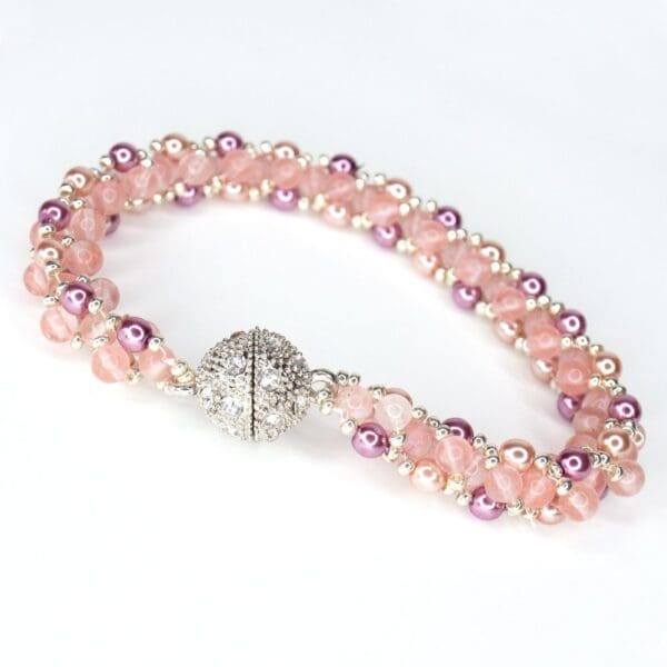 Beadwork bracelet in shades of pink with magnetic diamanté studded clasp