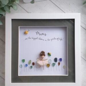 Sea glass picture of a Mor Maids fairy in a sea of wild flowers with a bumblebee maid using a periwinkle shell and the quote 'Mums are the biggest blooms in the garden of life'