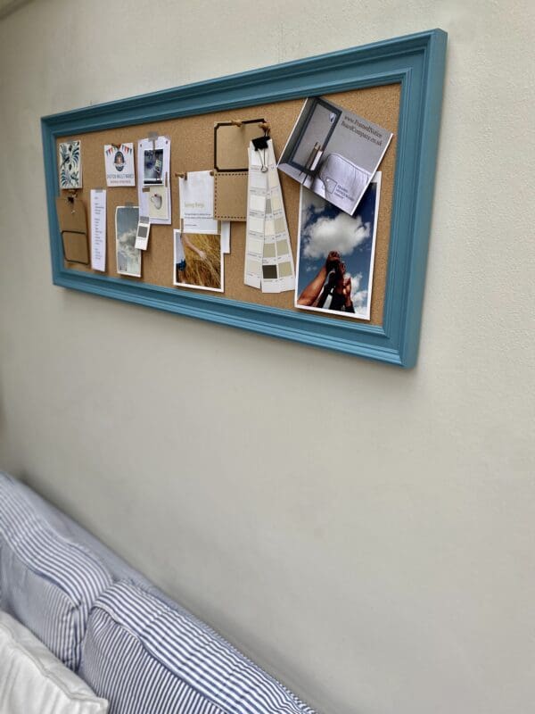 Long blue framed cork pinboard