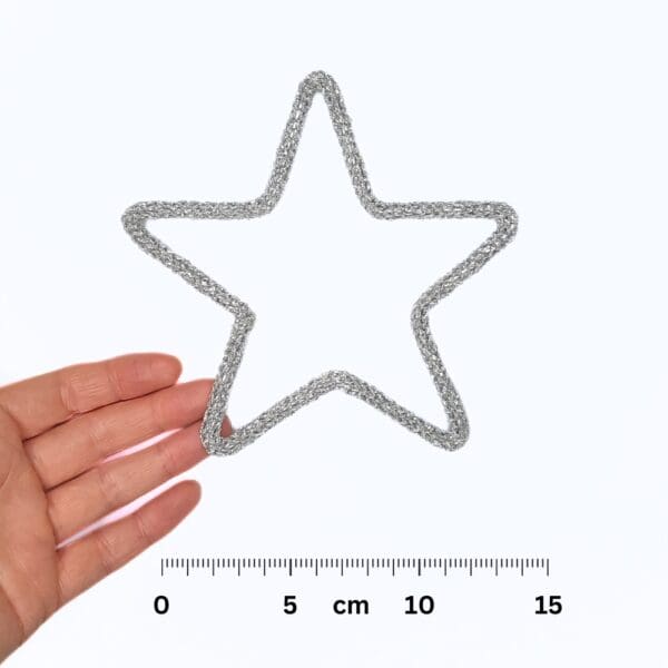 Knitted wire Christmas decoration featuring a silver star