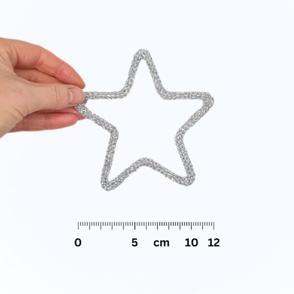 Knitted wire Christmas decoration featuring a silver star